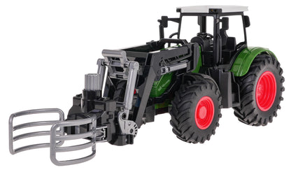 Traktor sa hvataljkom — Zelena