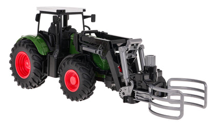 Traktor sa hvataljkom — Zelena