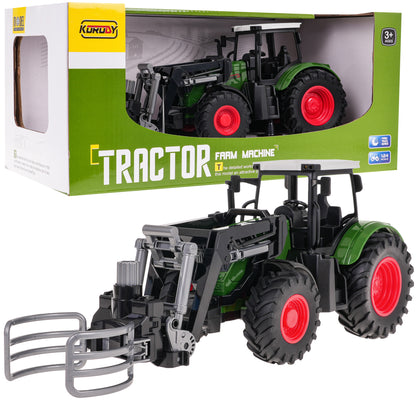 Traktor sa hvataljkom — Zelena